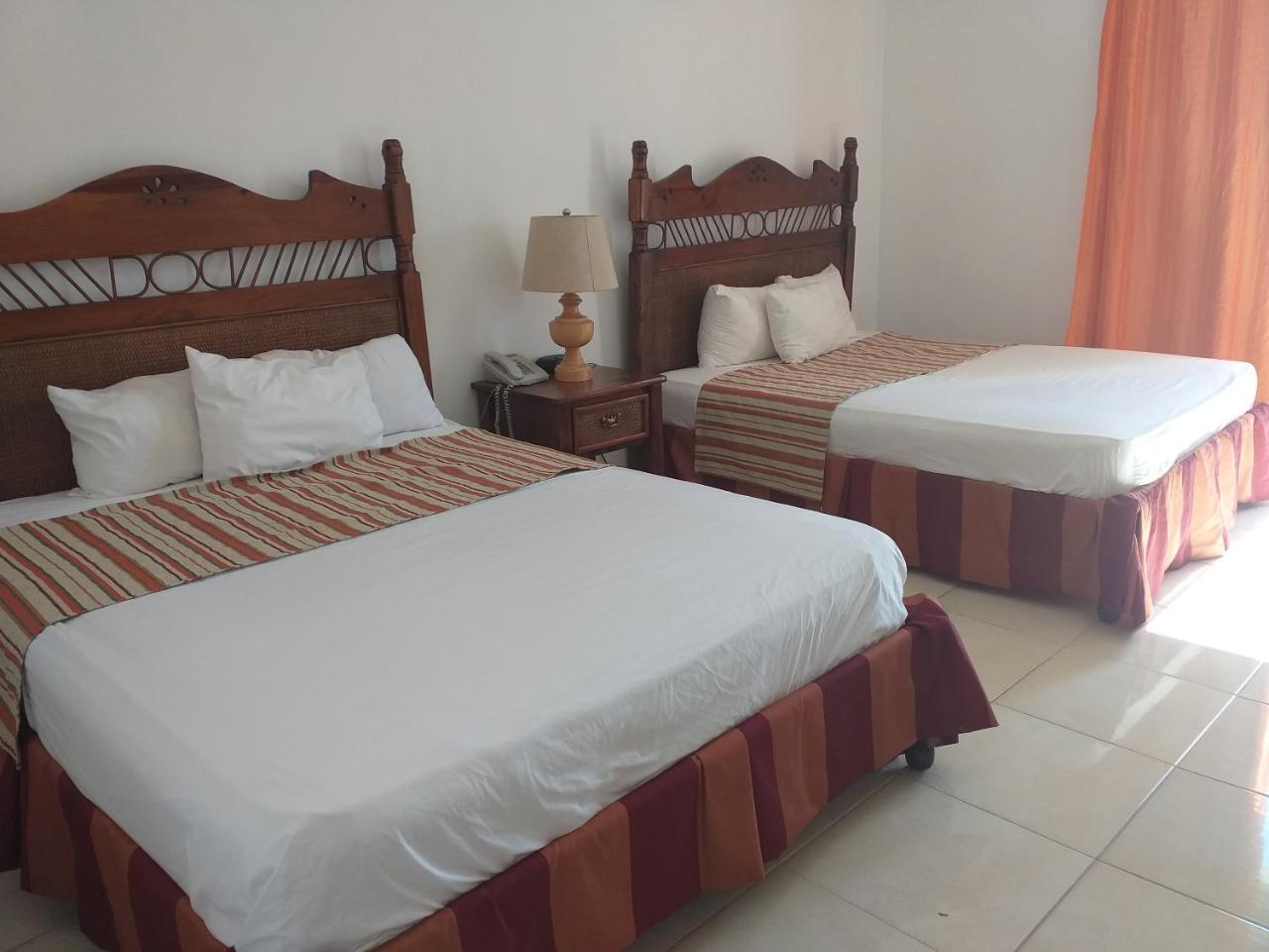 Hotel Dominicana Plus Bávaro Pokoj fotografie